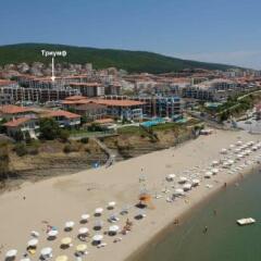 Отель Triumph Holiday Village пляж фото 2