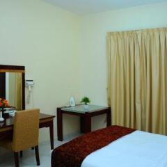 Отель Tulip Inn Hotel Apartments ОАЭ, Аджман - отзывы, цены и фото номеров - забронировать отель Tulip Inn Hotel Apartments онлайн удобства в номере