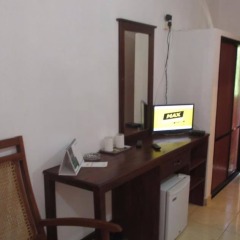 Отель Larns Villa сейф в номере