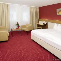 Austria Trend Hotel Anatol комната для гостей фото 4