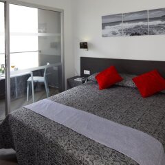 Отель Migjorn Ibiza Suites & Spa комната для гостей фото 3