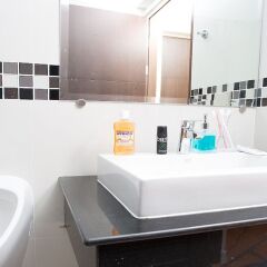 Апартаменты BBG Seaside Luxurious Service Apartment ванная фото 2