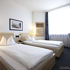 Отель IntercityHotel Rostock комната для гостей фото 4