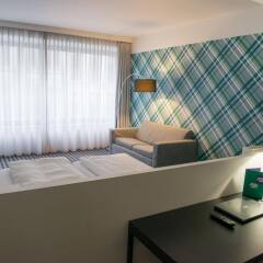 Отель PREMIER SUITES PLUS Antwerp комната для гостей фото 2