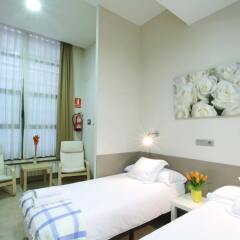 Апартаменты Barcelona Sants Station Apartments Барселона комната для гостей фото 5