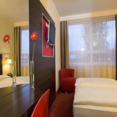 AZIMUT Hotel City South Berlin 3* Стандартный номер с разными типами кроватей фото 4