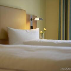 Отель IntercityHotel Düsseldorf комната для гостей фото 2
