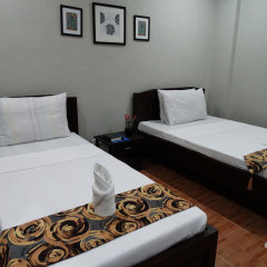 Отель Harbour Gardens Tourist Inn Филиппины, Тагбиларан - отзывы, цены и фото номеров - забронировать отель Harbour Gardens Tourist Inn онлайн комната для гостей фото 4