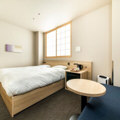 Отель ALPHABED INN Fukuoka Ohori Park Фукуока комната для гостей