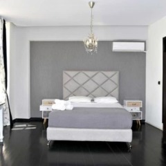 Апартаменты Antisthenes Apartments комната для гостей