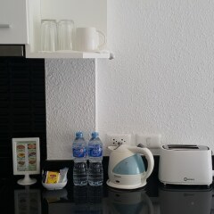 Отель Vtsix Condo Service at View Talay Condo удобства в номере