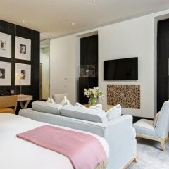 Отель Portrait Suites комната для гостей фото 4