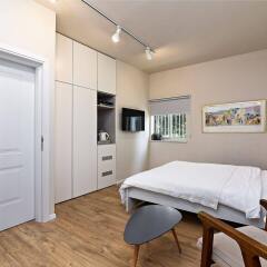 Апартаменты Hanasi 129 - Boutique Apartments Хайфа комната для гостей фото 5