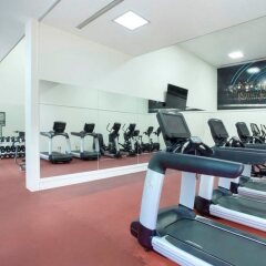Отель Pacific Island Club Тамунинг фитнесс-зал фото 4