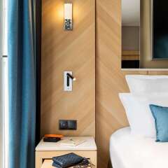 Отель Best Western Premier Louvre Saint Honore сейф в номере