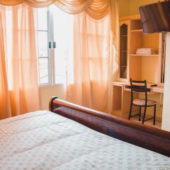 Hotel Boutique Casa Jardines Сан-Педро-Сула фото 3