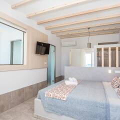 Отель Alexander Studios & Suites - Adults Only комната для гостей фото 9