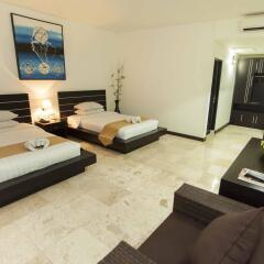 Отель Satriya Cottages комната для гостей