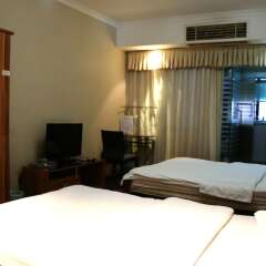 Отель Tu Plus Service Apartment Shenzhen Convention Centre Futian Branch Китай, Шэньчжэнь - отзывы, цены и фото номеров - забронировать отель Tu Plus Service Apartment Shenzhen Convention Centre Futian Branch онлайн удобства в номере фото 2