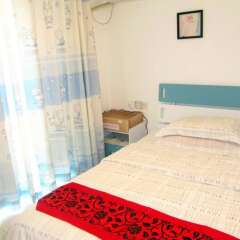 Отель Meiru Rujia Hotel Apartment Китай, Гуанчжоу - отзывы, цены и фото номеров - забронировать отель Meiru Rujia Hotel Apartment онлайн комната для гостей фото 5
