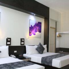 Отель Executive Plaza Hotel Филиппины, Манила - отзывы, цены и фото номеров - забронировать отель Executive Plaza Hotel онлайн комната для гостей фото 5