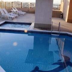 Отель Dolphin Hotel Apartments ОАЭ, Дубай - отзывы, цены и фото номеров - забронировать отель Dolphin Hotel Apartments онлайн бассейн фото 3