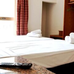 Апартаменты Dragonara Apartments комната для гостей фото 5