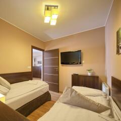 Апартаменты VisitZakopane Sky Apartments комната для гостей фото 2