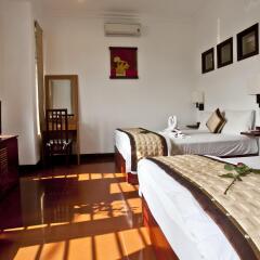 Отель Flower Garden Homestay Хойан комната для гостей