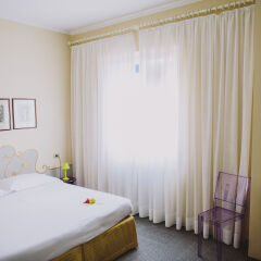 Отель Albergo Minerva Церковь Св. Маргариты Лигурийской комната для гостей фото 2