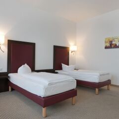 Отель AZIMUT Hotel Munich Германия, Мюнхен - 10 отзывов об отеле, цены и фото номеров - забронировать отель AZIMUT Hotel Munich онлайн комната для гостей фото 5