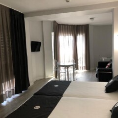Отель Quo Eraso Aparthotel Испания, Мадрид - 9 отзывов об отеле, цены и фото номеров - забронировать отель Quo Eraso Aparthotel онлайн комната для гостей фото 3