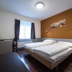 Отель Alexander Guesthouse Цюрих комната для гостей