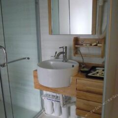Отель Jiuyang Guest House ванная фото 2