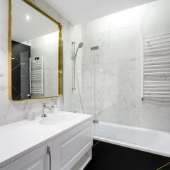 Отель Siedmiogrodzka Luxury Apartment Польша, Варшава - отзывы, цены и фото номеров - забронировать отель Siedmiogrodzka Luxury Apartment онлайн ванная