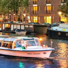 Отель Luxury Suites Amsterdam городской автобус