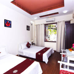 Отель Hanoi Central Homestay Ханой комната для гостей