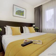 Отель Citadines Sainte-Catherine Brussels Бельгия, Брюссель - отзывы, цены и фото номеров - забронировать отель Citadines Sainte-Catherine Brussels онлайн комната для гостей