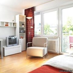 Апартаменты Frederics Serviced Apartments Мюнхен комната для гостей фото 4