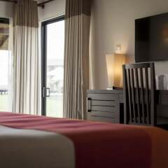 Отель The Calm Resort & Spa удобства в номере фото 2