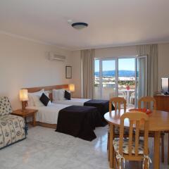 Отель Apartamentos Turisticos Jardins Da Rocha комната для гостей фото 2