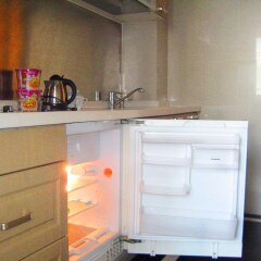 Апартаменты She & He Service Apartment - Huifeng удобства в номере фото 2