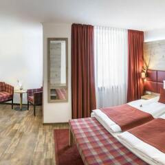 Отель Drei Loewen Hotel Германия, Мюнхен - 14 отзывов об отеле, цены и фото номеров - забронировать отель Drei Loewen Hotel онлайн комната для гостей фото 3
