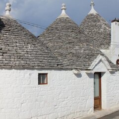 Отель Trulli Pietradimora B&B Альберобелло спортивное сооружение