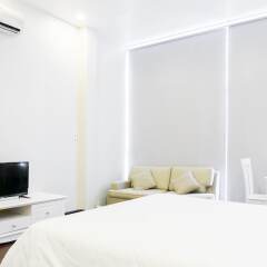 Отель Qhome Sai Gon Nguyen Huu Canh комната для гостей фото 4