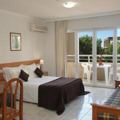 Отель Apartamentos Turisticos Jardins Da Rocha комната для гостей