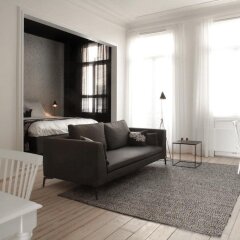 Отель Maison Nationale City Flats & Suites Бельгия, Антверпен - отзывы, цены и фото номеров - забронировать отель Maison Nationale City Flats & Suites онлайн комната для гостей