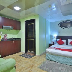 OYO 261 Remas Hotel Apartment Дубай комната для гостей фото 4