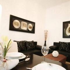 Отель City Center Luxury Apartments Австрия, Вена - отзывы, цены и фото номеров - забронировать отель City Center Luxury Apartments онлайн комната для гостей фото 3