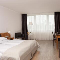 Отель Wyndham Hannover Atrium Германия, Ганновер - 1 отзыв об отеле, цены и фото номеров - забронировать отель Wyndham Hannover Atrium онлайн комната для гостей